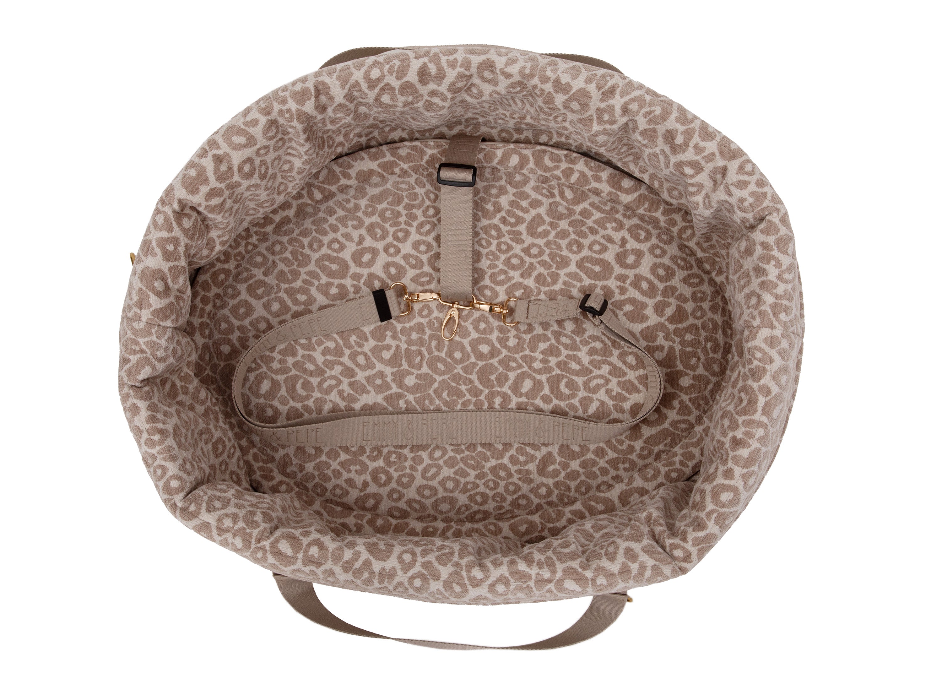 Wau-Snuggle Reisebett in oval mit einem weichen, creme/braunem Innenfutter mit Leopardenmuster und creme farbenen Gurten zum Anschnallen innen