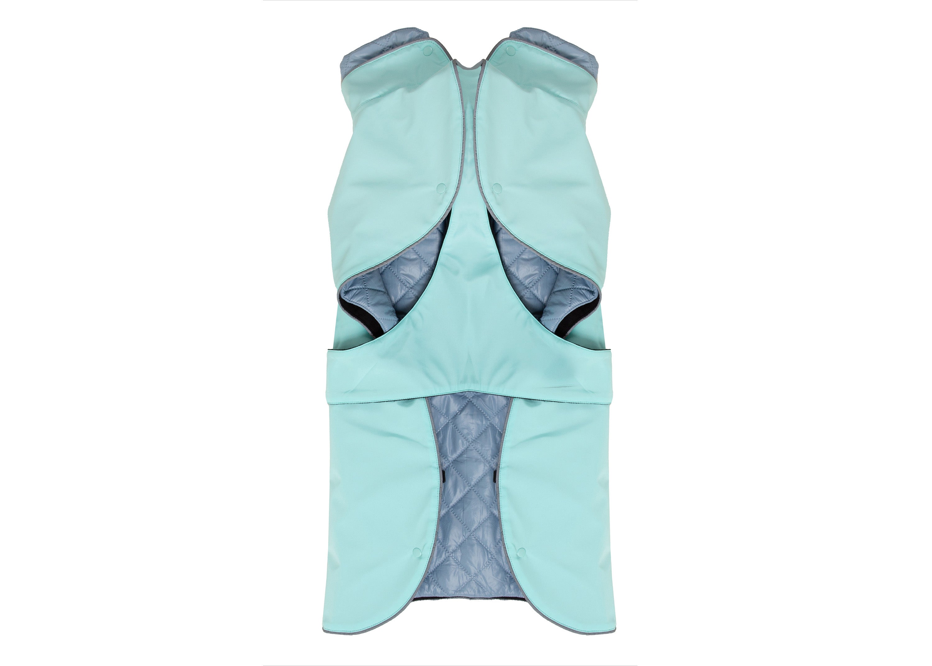 Innenansicht des Wau-Coat Hundemantels  in Mint mit herausnehmbarem Innenfutter in Blau, hohem Kragen und integriertem Bauchschutz