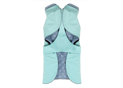 Innenansicht des Wau-Coat Hundemantels  in Mint mit herausnehmbarem Innenfutter in Blau, hohem Kragen und integriertem Bauchschutz