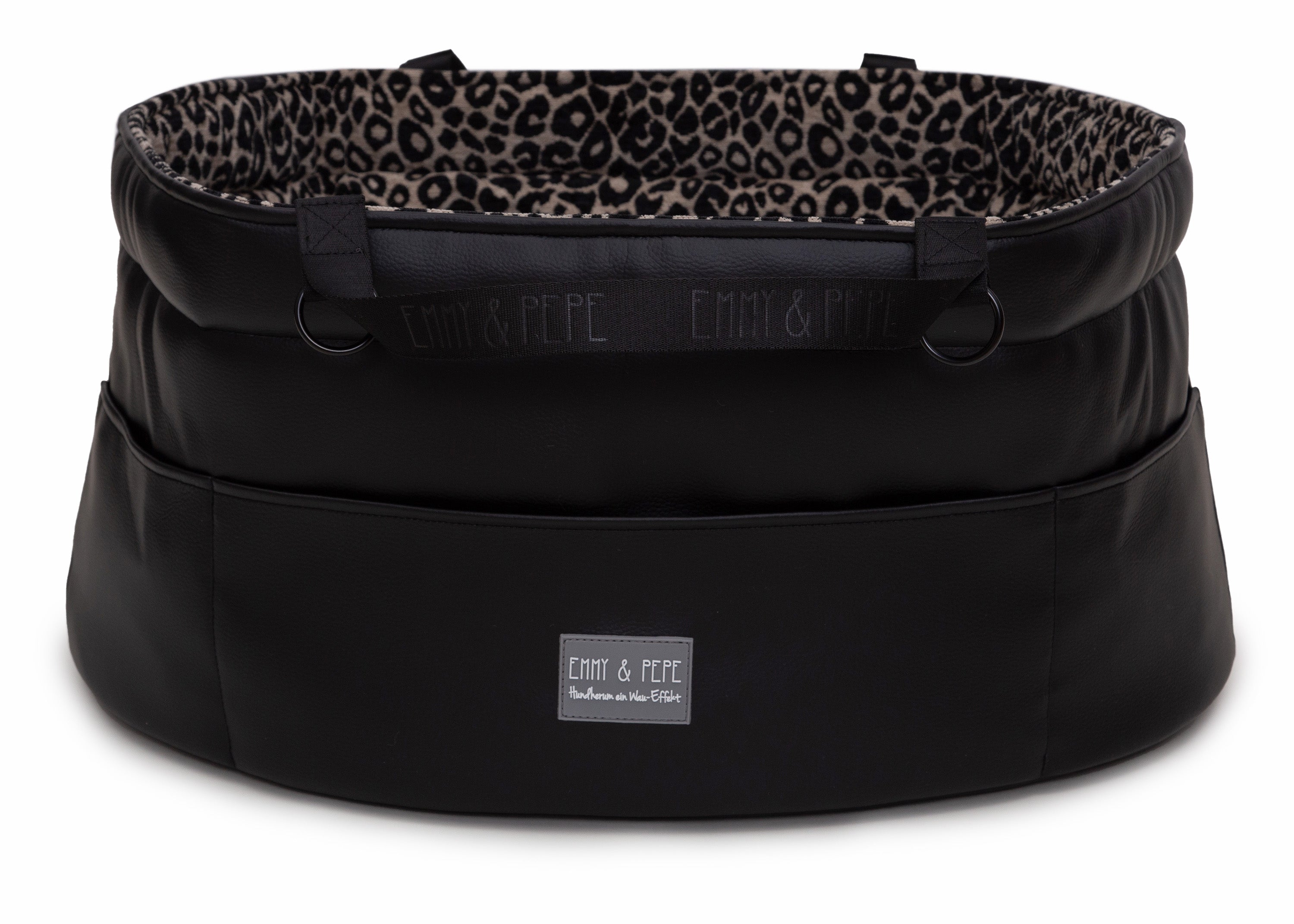 Wau-Snuggle Reisebett mit robustem schwarzen Kunstleder an der Außenseite und einem weichen, beigen Innenfutter mit schwarzem Leopardenmuster in oval 
