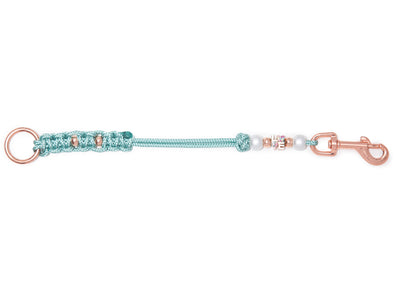 Wau-Hold praktischer Alltagshelfer Waussoni in Mint und Rosegold auf weißem Hintergrund