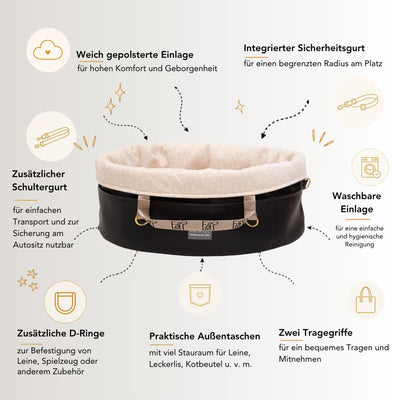 USP Grafik Wau-Snuggle Royal Hundekörbchen für unterwegs von EMMY & PEPE mit heruntergeklapptem Rand, schwarzem Kunstleder und weicher Liegefläche.