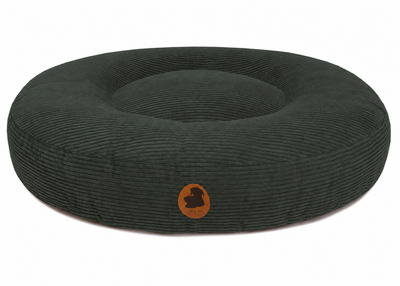 orthopaedisches Hundebett Wau-Bed Cord für Hunde auf weißem Hintergrund in der Farbe Grün in Oval von EMMY & PEPE