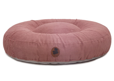 orthopaedisches Hundebett Wau-Bed Cord für Hunde auf weißem Hintergrund in der Farbe Rosa in Oval von EMMY & PEPE