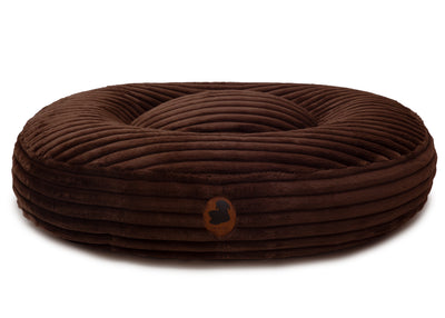 orthopaedisches Hundebett Wau-Bed Kuschelcord Big für Hunde auf weißem Hintergrund in der Farbe Braun in Oval von EMMY & PEPE