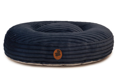 orthopaedisches Hundebett Wau-Bed Kuschelcord Big für Hunde auf weißem Hintergrund in der Farbe Dunkelblau in Oval von EMMY & PEPE